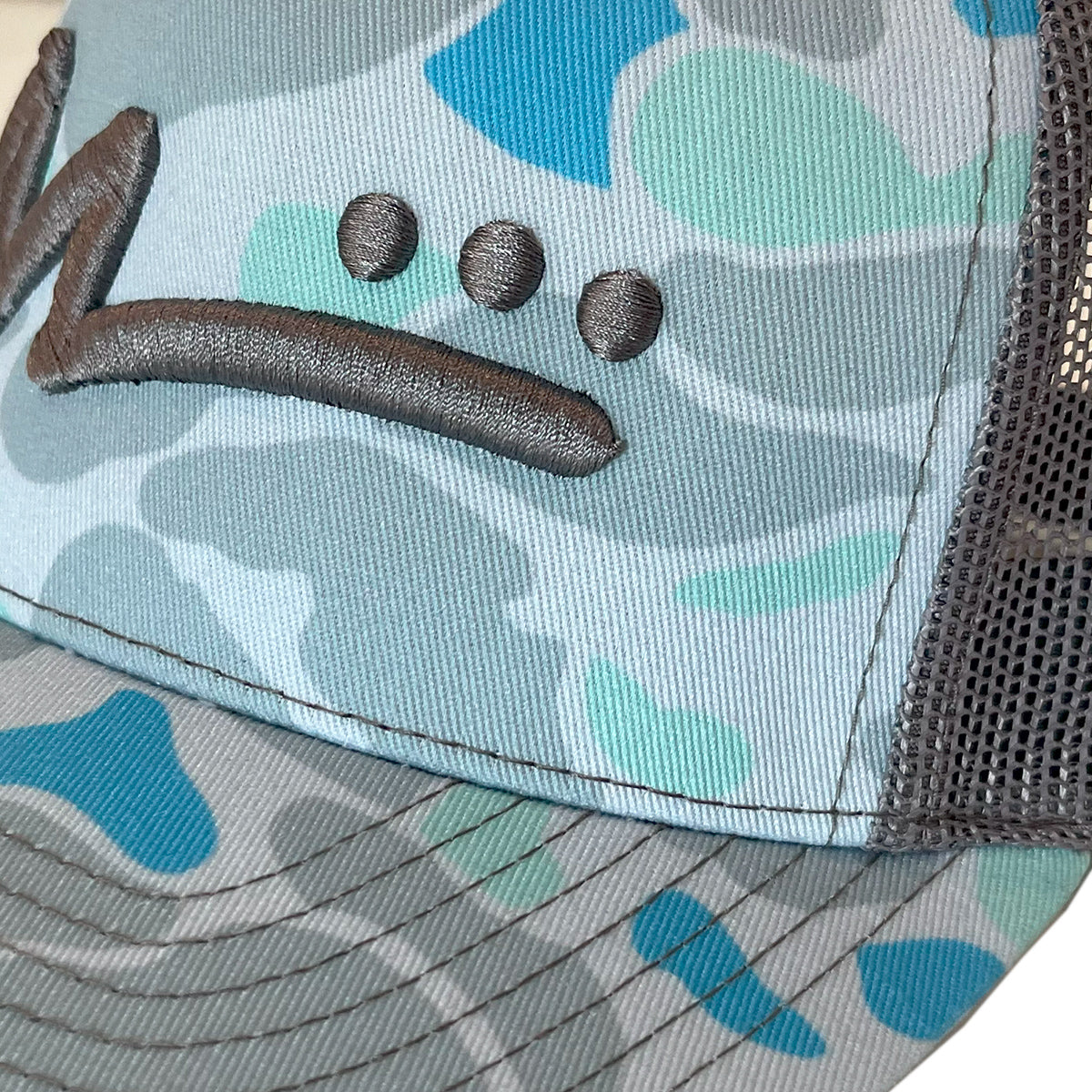 M Logo Trucker Hat - Cayman Camo